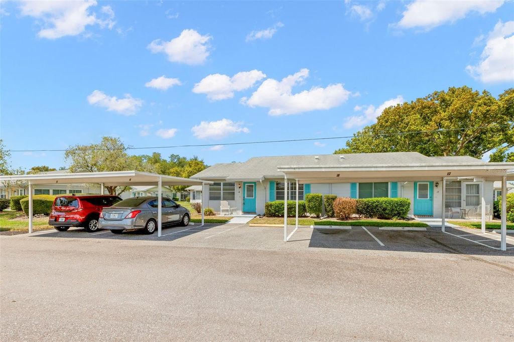 Photo of 401 De Grasse Place #18, Sun City Center, FL 33573 (MLS # TB8491685)