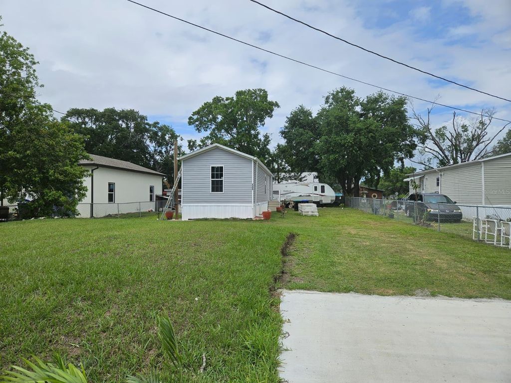 Photo of 123 4th Street, Orlando, FL 32824 (MLS # O6400074)