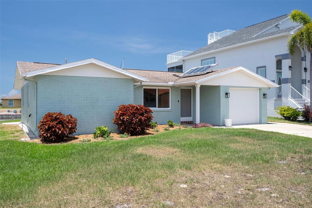Photo of 15713 Century Drive, Hudson, FL 34667 (MLS # TB8391876)