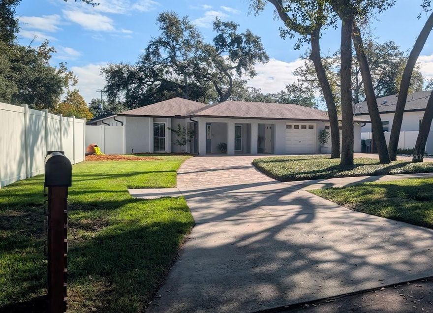 One or more photo(s) has been virtually staged. Exceptional South Tampa Gem – No Flood Insurance Required! 
Welcome to this rare find in South Tampa! This beautifully maintained 3-bedroom, 2-bathroom home with an oversized 2-car garage sits on a street lined with newer homes, offering both charm and peace of mind. Home remained high and dry during Helene and Milton! 
This is Florida Living at Its Finest! Enjoy energy savings with fully paid solar panels and a layout designed for sunshine and relaxation. The circular driveway provides ample parking, including additional space for your RV or boat. 
Step inside to discover a well planned layout, updated kitchen with quartz countertops and newer flooring throughout. Sliding glass doors open to a screened-in pool area, perfect for cooling off or entertaining. The backyard features a new Tuff Shed for extra storage and a covered patio for outdoor lounging. Fully fenced and irrigated lawn!
The oversized garage includes built-in storage and plumbing ready for a third bathroom, offering flexibility for future expansion. 
Recent Updates Include: Roof (2020) Water Heater (2024) Washer & Dryer (2024) Driveway & Pool Deck Pavers (2021) Gutters (2023) Pool Cage Screens replaced (2025) Vivint Security System and the attic has Spray Foam Insulation for extra energy savings!
Prime Location - Minutes from MacDill Air Force Base, MacDill 48 Park, Bayshore Blvd, Ballast Point Park, and convenient access to the Crosstown Expressway, grocery stores, and dining hotspots.