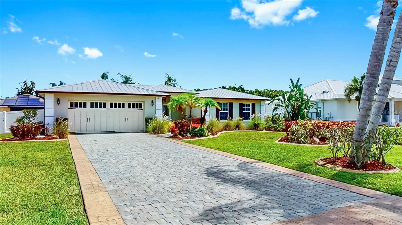 This gorgeous and beautifully maintained pool home is set on more than 15,000 square feet of land that is full of tropical landscaping. The back yard fencing offers plenty of privacy and the extended brick paved driveway leads to a covered porch with a set of double doors that welcome you into this stunning home. This 3 bedroom 2 bath home has a huge bonus room that can be utilized as a office, media, or activity room. The kitchen offers a natural gas stove and overlooks the inviting pool and lanai. The split floor plan keeps the primary suite private with a large bathroom, walk-in shower, and walk-in closet. There are "NO" HOA or CDD fees allowing for boats, boat trailers, RVs, and all of your favorite toys. If you enjoy boating, fishing, kayaking, or jet skiing, you are only a half a mile from Domino Boat Ramp located on the Little Manatee River.