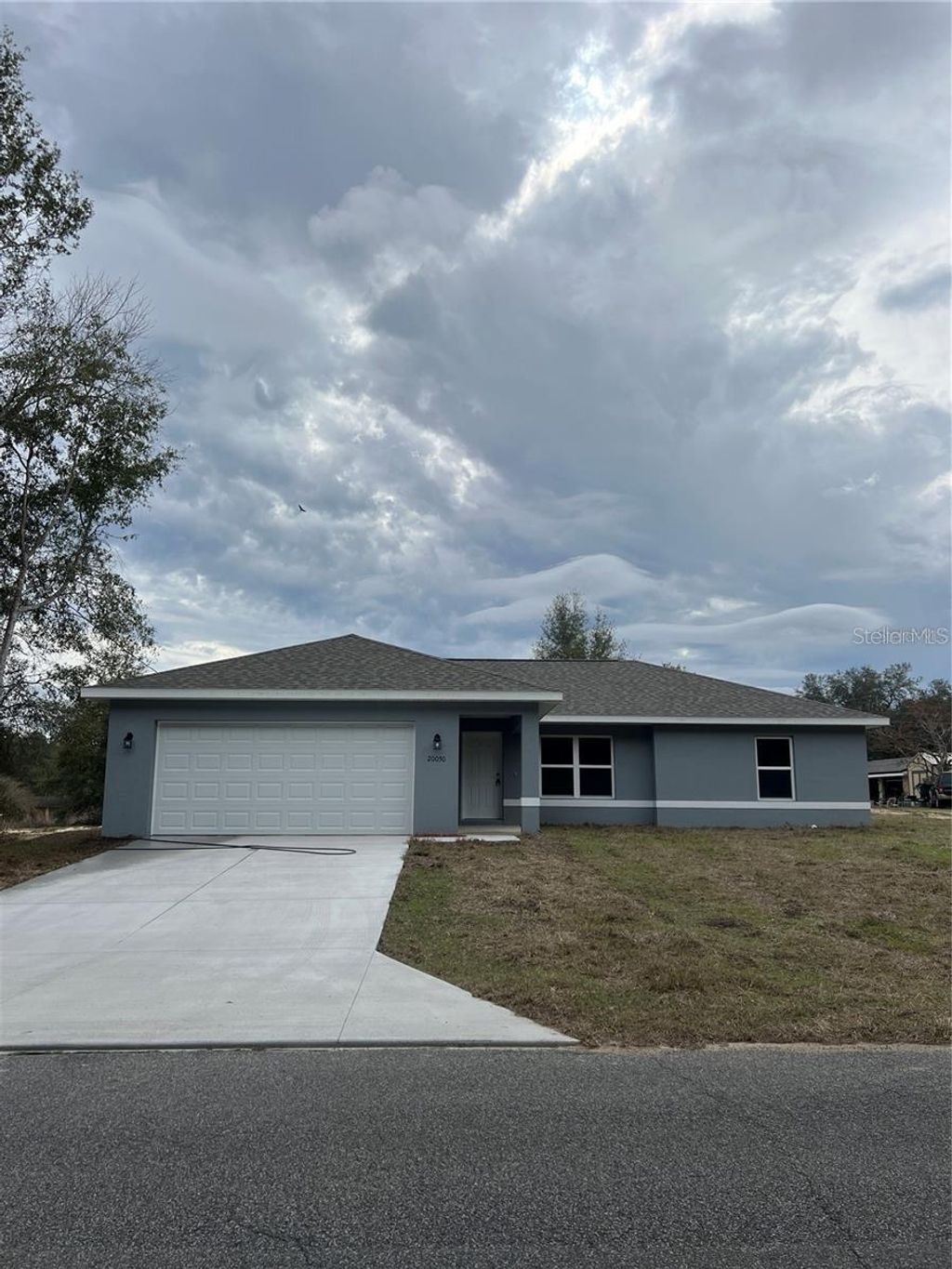 Photo of 11891 SE 70th Avenue Road, Belleview, FL 34420 (MLS # OM717417)