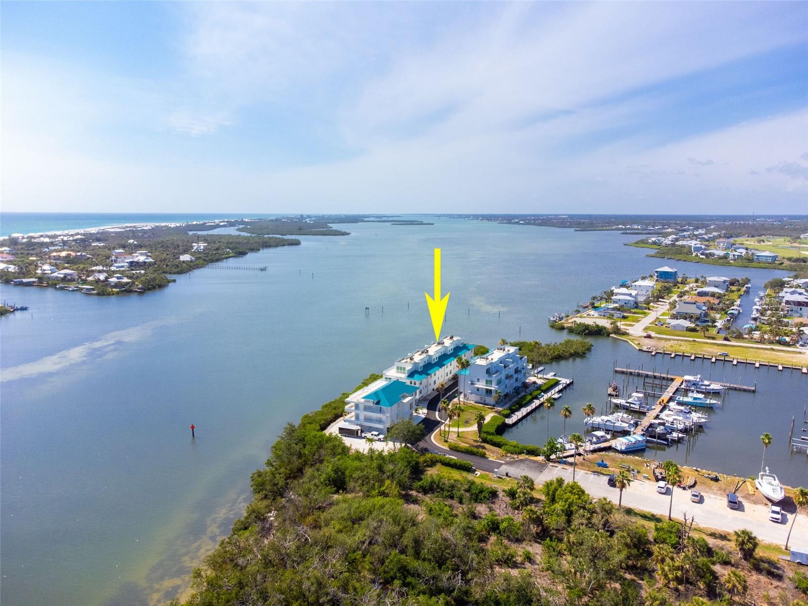 Imagine waking up to the serene beauty of Lemon Bay and spending your evenings mesmerized by breathtaking INTRACOASTAL WATERWAY views. This custom-built, direct BAY-FRONT townhome offers an unparalleled waterfront lifestyle.
Built to withstand the elements, this residence is a true fortress, boasting concrete construction from base to roof, a brand-new 2023 metal roof, and new 2023 HURRICANE-IMPACT windows and doors for ultimate security.
Accessed by a private ELEVATOR above your oversized two-car garage, three spacious floors unfold, each with its own private balcony. Picture yourself watching dolphins play or launching your kayak directly into the Intracoastal—this is true waterfront living at your fingertips.
The heart of the home, the main living area on the third floor, features an open-concept design centered around a 2023 gourmet kitchen. This dream kitchen boasts a massive granite island and exquisite custom, soft-close, hand-rubbed maple cabinetry, perfect for memorable gatherings.
Comfort abounds with two en-suite master bedrooms on the second floor and a versatile third en-suite master on the fourth. This upper suite includes a wet bar and can easily transform into a private in-law retreat, accessible by both elevator and stairs. The luxurious master bathroom offers a double sink vanity, a garden tub, a large walk-in shower, and a generous walk-in closet. All bathrooms maintain a consistent level of luxury with maple cabinetry and granite countertops.
Additional modern comforts include two newer AC units (2018), new deck tiling (2023), and updated electrical (2023) throughout.
Beyond the home, an extraordinary lifestyle awaits. You're mere steps from CAPE HAZE MARINA, offering convenient wet and dry boat storage, comprehensive marina services, and exclusive access to its inviting pool and hot tub. A short distance brings you to the ferry service for a quick escape to Palm Island, while an abundance of private and public golf courses beckon. Plus, the charm of historic Boca Grande and world-class fishing is just minutes away.