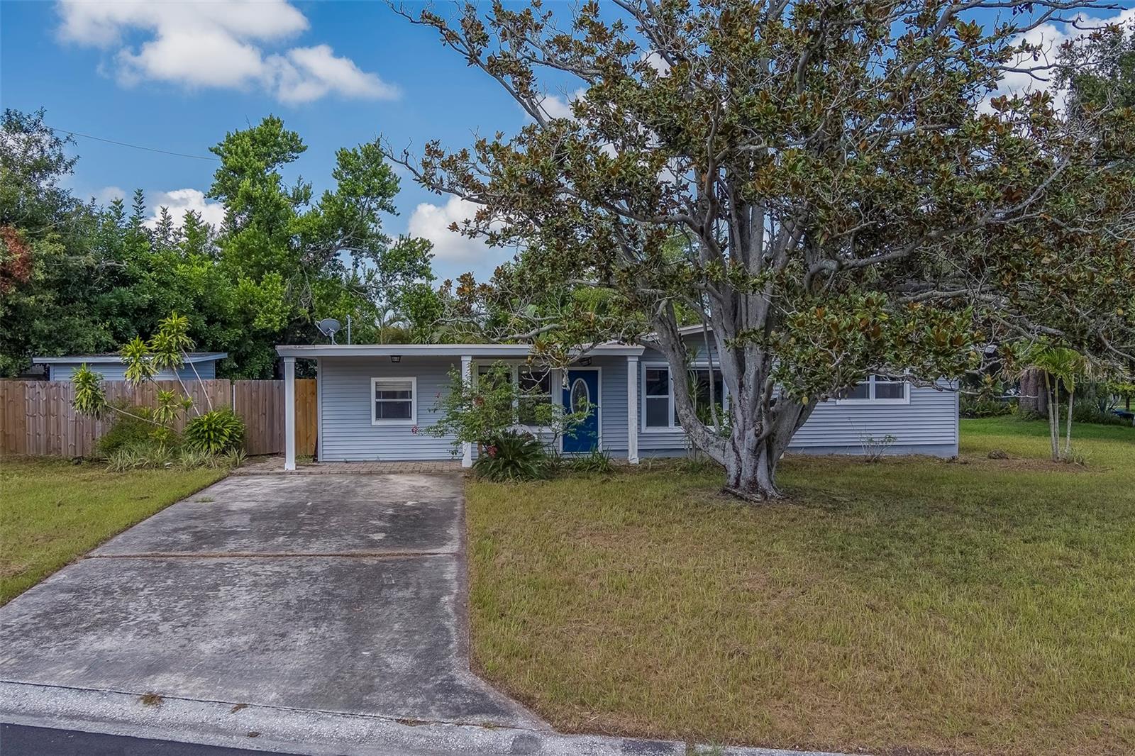 This charming, 3 bedroom, 2 bathroom single-family home offers a haven of comfort and Florida living. Nestled in a quiet neighborhood that is in a NON-EVACUATIN area and NON FLOOD ZONE gives you peace of mind. Upon entering, you will love the open concept of the living room and dining area that has large sliding glass doors that open onto a screened lanai. The kitchen is accessible from the dining area and has ample storage, granite countertops and stainless steel appliances. The home features a split floor plan with the main suite located on one side of the house, offering a walk-in closet and en suite bathroom. There is space for a washer and dryer as well. There are two additional nicely-sized bedrooms and another full bathroom which are located on the other side, near the family room. A custom-built storage shed matching the home's style adds convenience and extra storage space. This home is conveniently located close to Tyrone Mall, several parks, and within minutes of downtown St. Petersburg and the beautiful Gulf beaches. Don't miss this opportunity!