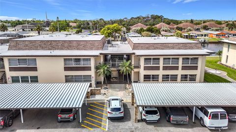 Photo of 4812 Jasper Drive #203, New Port Richey, FL 34652 (MLS # W7885083)