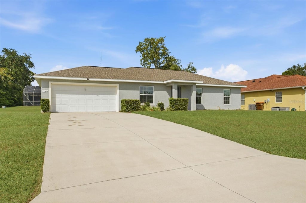 Photo of 13964 SW 30th Terrace Road, Ocala, FL 34473 (MLS # O6452508)