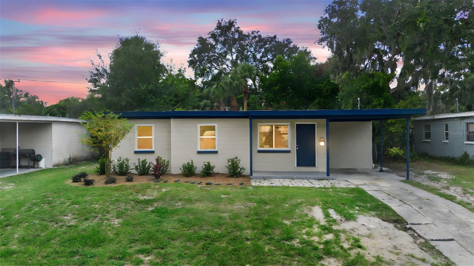 Daytona: Welcome home to this 3 bedroom 2 bathroom home with NEW Roof, NEW HVAC, NEW Windows, NEW Appliances and some NEW plumbing. It is move in ready and ready for it's new owners. This house has great curb appeal with the blue accents and fresh landscaping. The living room is bright with large windows to allow for natural light to flood the home. There is a separate dining room off the kitchen for easy entertaining. The updated kitchen is beautiful! Stainless steel appliances, white cabinets and plenty of counter and storage space. Both bedrooms have ceiling fans to keep you cool and the Primary has an En Suite bathroom with walk in shower. Guest bathroom features a shower/tub combo. Inside utility room to make laundry easy. The fenced back yard has plenty of room for everyone to run and play! 1 car carport can be used to park your car or make it an outdoor living space! The location is close to shopping, restaurants and one of the World's most popular beaches!