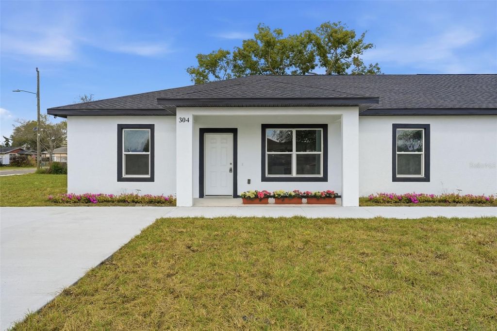 Photo of 304 Pearl Street, Haines City, FL 33844 (MLS # O6388439)