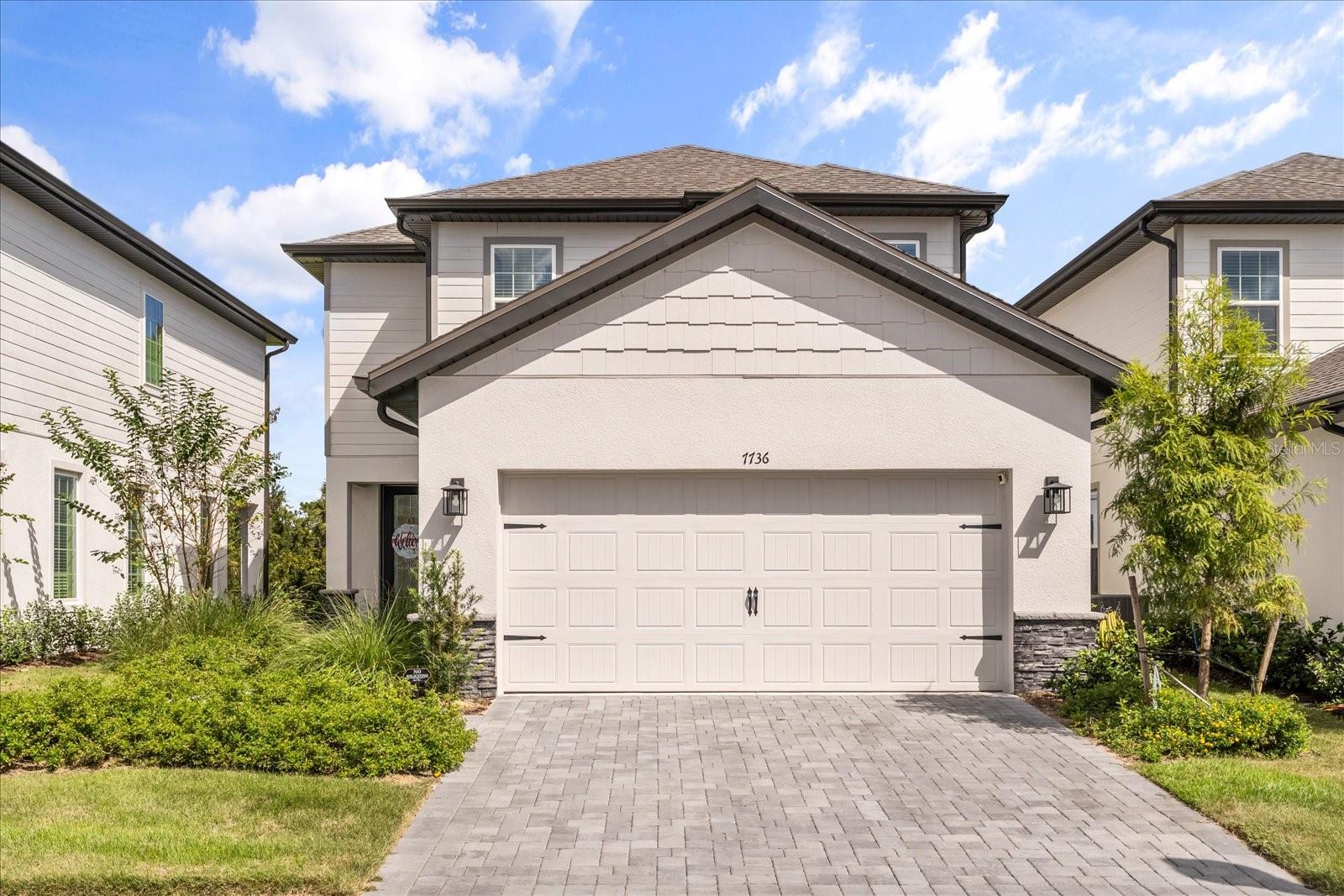 Why wait to build? PREMIUM LOT with CONSERVATION AND WATER VIEWS now available! Step inside The Toho, a stunning two-story home designed for comfort and connection. With 6 spacious bedrooms and 4 full bathrooms, there’s room for everyone to live and relax with ease. The open-concept layout creates a natural flow from the main living area to the chef-inspired kitchen, where quartz countertops, a large island, and generous storage make everyday living and entertaining effortless. Upstairs, a versatile loft provides the perfect space for a home office, media area, or cozy retreat for the family to gather. The primary suite is a true highlight — a serene escape featuring a large walk-in closet and a spa-like en-suite bath designed for relaxation and comfort. Natural light fills the home through expansive windows and sliding glass doors that open to an extended covered patio, creating the ideal setting for outdoor entertaining. A spacious laundry room and thoughtful design details throughout add convenience and style to everyday living. Located in Reunion Village, just minutes from Disney, Universal, and world-class golf, residents enjoy access to resort-style amenities including a 10-acre waterpark, multiple pools, fitness centers, tennis courts, nature trails, playgrounds, and 24-hour guard-gated security. The HOA covers lawn care, exterior maintenance, cable, internet, and more. Offering a truly turnkey lifestyle in one of Central Florida’s most sought-after resort communities. Schedule your private showing today and experience resort living every day! **This house comes with a REDUCED RATE through the seller's preferred lender. This is a lender-paid rate buydown that reduces the buyer's interest rate and monthly payment.**