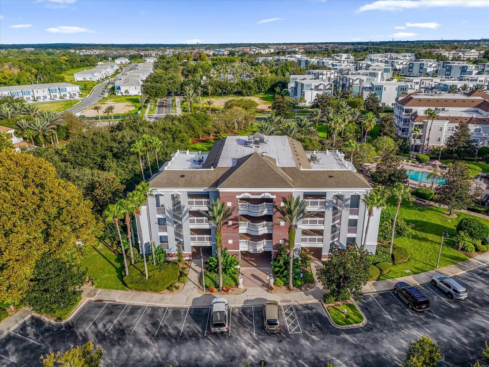 3 Bedroom 3 Full Bath GROUND FLOOR CORNER UNIT just steps away from the community pool & a short walk to the Resort's Waterpark. This spacious villa with an open floor plan beddrooms and ceramic tile in the wet areas, NO CARPET! It is being offered FULLY FURNISHED and has been professionally decorated to resort rental standards. This FANTASTIC condo would make great primary residence, 2nd home or investment property. The kitchen features ceramic tile flooring, hardwood cabinets with crown moulding, granite countertops and stainless appliances. This corner unit has several windows that provide an abundance of natural light throughout. Enjoy countless hours of relaxation from your private balcony. You will also enjoy adequate space between the condo building that add additional privacy from your neighbors. There is additional storage adjacent to the condo, which is an added bonus only available with the corner units. You may also access the balcony from the primary bedroom. The primary bath includes granite countertops, dual vanities, garden tub and separate walk-in shower. The two remaining bedrooms, one being en suite, have a tub & shower combo. There is a full size stackable washer & dryer also located in this villa. Great location in the heart of Reunion, a Must See! **ACTIVE REUNION RESORT MEMBERSHIP ASSOCIATED** This property has an ACTIVE MEMBERSHIP which is transferrable to the next owner. Reunion Resort is a 2,300 acre Resort and Golf Community with three championship signature golf courses, a multimillion dollar waterpark located just 6 miles from DISNEY and the parks, 20 minutes to the Orlando International Airport and easily accessible to the major highways.