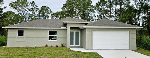Photo of 842 Giorgio Avenue S, Lehigh Acres, FL 33974 (MLS # A4686402)
