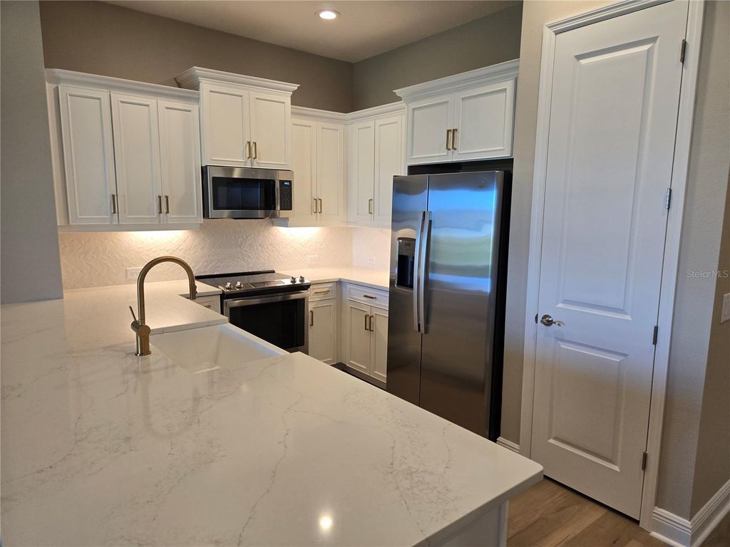 Photo of 24811 Buckingham Way, Port Charlotte, FL 33980 (MLS # A4668320)