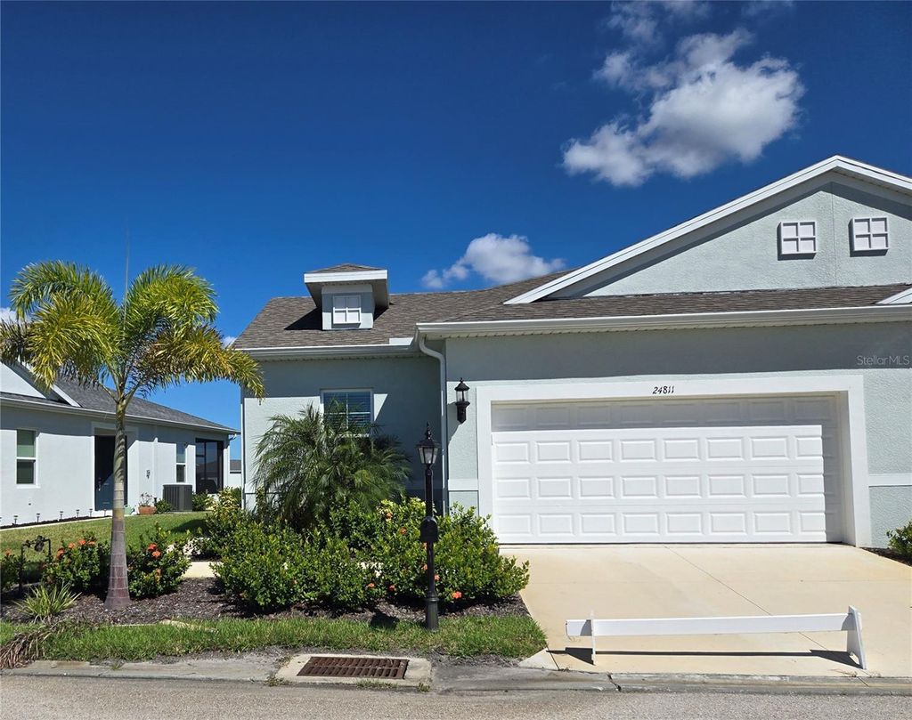 Photo of 24811 Buckingham Way, Port Charlotte, FL 33980 (MLS # A4668320)