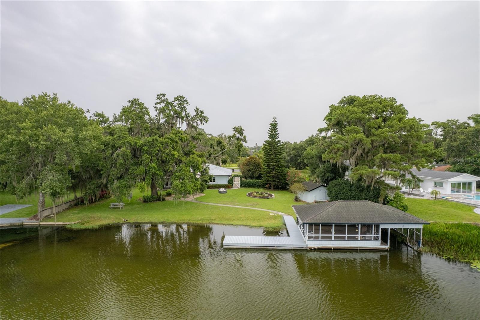 SPECTACULAR LAKEFRONT HOUSE WITH BOAT HOUSE. 2 CAR GARAGE! 3 BEDS 3 BATHS PLUS OFFICE ROOM! UPGRADED OPEN FLOOR PLAN WITH A BEAUTIFUL OPEN KITCHEN GRANITE COUNTER TOPS, STAINLESS STEEL APPLIANCES, WOOD FLOORS THROUGHOUT, GORGEOUS UPGRADED BATHROOMS AND MASTER WITH TILE FLOORS. HUGE BACKYARD WITH A BREATHTAKING LAKE VIEW AND ROOM FOR A POOL! OWNED SOLAR PANELS FOR ELECTRIC SAVINGS! HOUSE IS ON A CUL-DE-SAC! ***EASY TO SHOW*** FOR SHOWING INSTRUCTIONS SEE BROKER REMARKS***