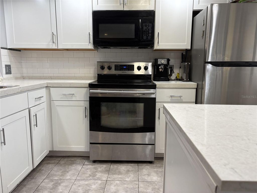 Photo of 2420 Winding Creek Boulevard #101, Clearwater, FL 33761 (MLS # TB8453132)