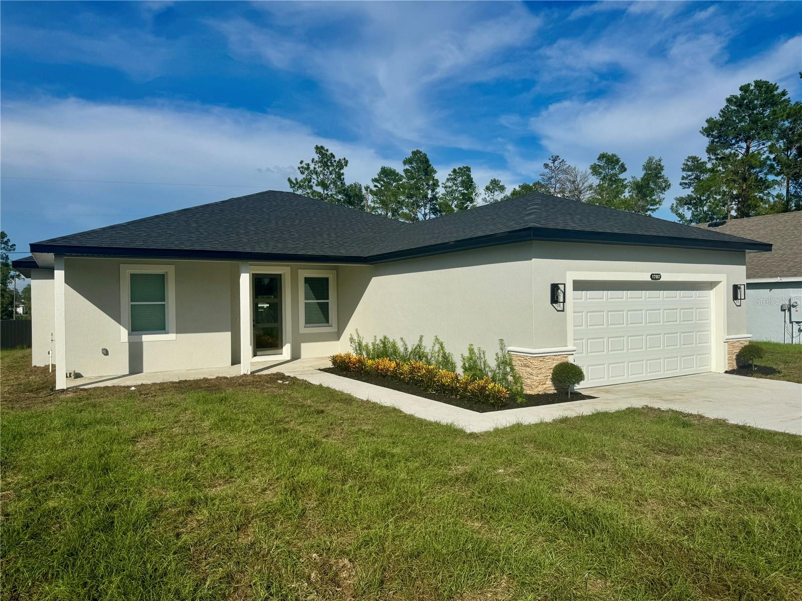 BUILDER WILL CONTRIBUTE UP TO $15,000 TOWARDS BUYERS CLOSING COSTS/PRE-PAIDS AND/OR A MORTGAGE RATE BUY-DOWN! This is a New Construction home is filled with luxury high end finishes throughout the 4 Bedroom 2 bath home. Starting right when you walk in with a 8ft tall door then stepping onto the luxury vinyl floors, the kitchen is all stainless steel appliances, quartz countertops, all real wood cabinets with soft close doors and drawers. The master suite has its own ensuite with a full stand up shower and separate soaker tub all wrapped in 24x48 luxury tile, and the same quartz counters and real wood cabinets. This is a Split floor plan the 3 other bedrooms are on the complete other side of the home along with the other luxury style bathroom. Did I mention the 2 huge Patios? Yep 2 there is one in the front and another in the back add more space to relax, entertain, and enjoy. Come see this house before it's gone.