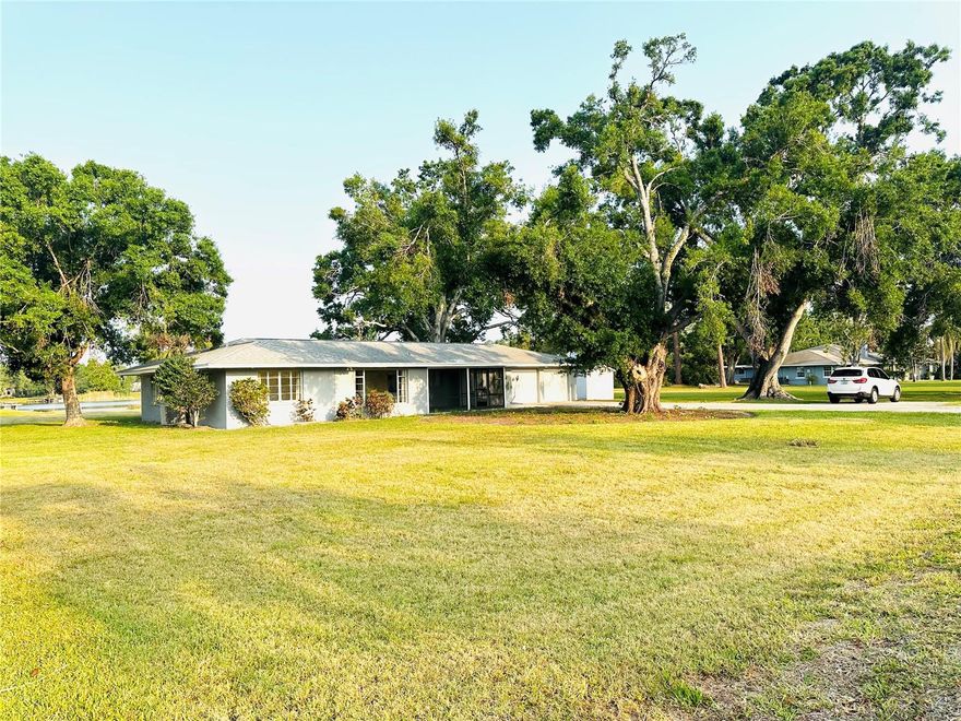 Enjoy the perfect fusion of comfort and style in the heart of Sarasota on a 1.28-acre property. Bring your boat and RV. Just 10 minutes away from the world-famous Siesta Key Beach, this charming 3-bedroom, 2-bathroom residence welcomes you with elegant luxury vinyl floors that flow seamlessly throughout the living spaces, creating an inviting and warm ambiance. The heart of the home, a beautifully renovated kitchen with all new appliances, boasts stunning quartz countertops that offer ample space for culinary creations and casual gatherings. The spacious bedrooms provide a serene retreat, perfect for rest and rejuvenation after a long day exploring the vibrant city of Sarasota. Step outside to enjoy the Florida sunshine in your private outdoor space with a huge lake view. Conveniently located, this property offers easy access to local amenities, dining, and entertainment, making it an ideal choice for those seeking both tranquility and convenience. Utilities, internet, and lawn maintenance are included. Just bring your clothes and enjoy your stay.