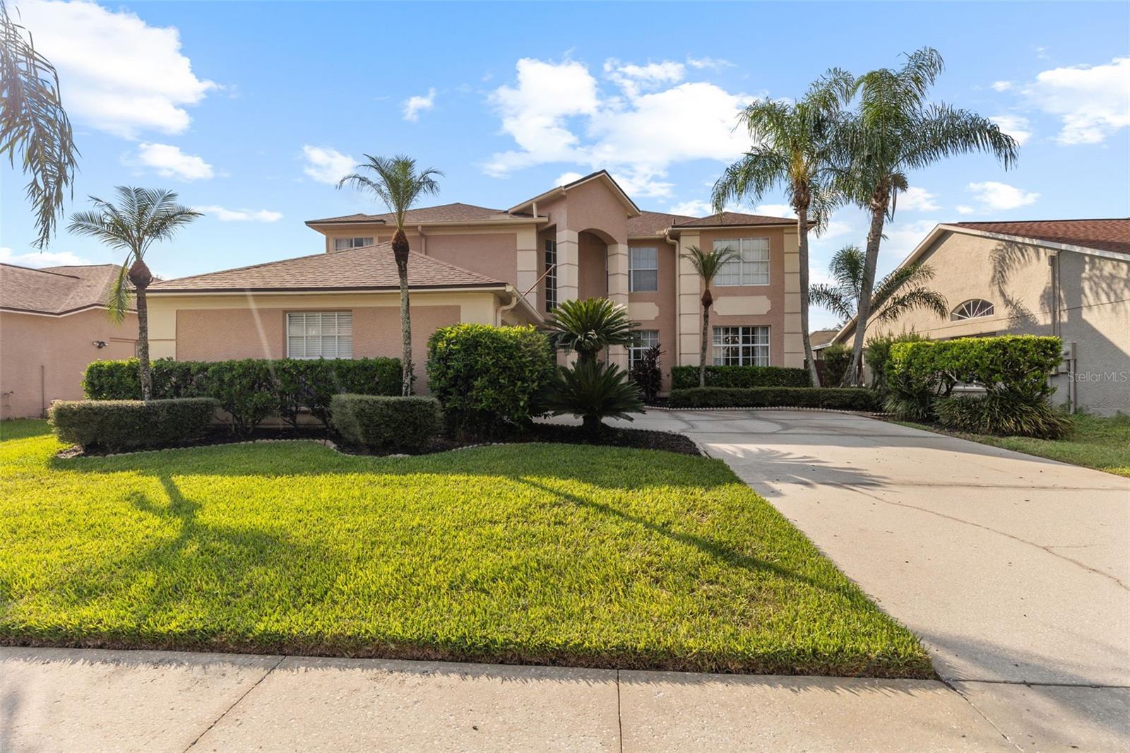 Welcome to 27045 Sea Breeze Way, where elegance meets Florida lifestyle living in this breathtaking 5-bedroom, 3-bathroom POOL HOME boasting 3,243 square feet of beautifully designed space in the heart of Wesley Chapel—with easy access to Tampa, top-rated schools, premier shopping and dining, I-75, I-275, and so much more! This residence provides peace of mind with major updates already completed, including a New Roof (2024) with a 15-year warranty, updated HVAC (2021) systems, and a New Pool Pump (2024). Step inside to find an open and inviting floor plan filled with natural light, featuring spacious living and dining areas enhanced with elegant crown molding in the main living spaces, detailed chair railing in the dining room, and custom molding in the living room. The attention to detail continues with an extra-large primary suite showcasing a beautifully designed ensuite bath and generous walk-in closet. The home’s exciting outdoor oasis includes a sparkling pool, a beautiful sun deck, an extended covered patio, and a fully fenced yard—creating the perfect space for relaxation, entertaining guests, or giving pets room to play. With generously sized bedrooms, a well-appointed kitchen, and thoughtful upgrades throughout, this home blends comfort and style seamlessly. Located in a prime Wesley Chapel community, just minutes from The Shops at Wiregrass, Tampa Premium Outlets, and with easy access to major highways, this property offers the ideal mix of convenience, sophistication, and true Florida lifestyle living.
