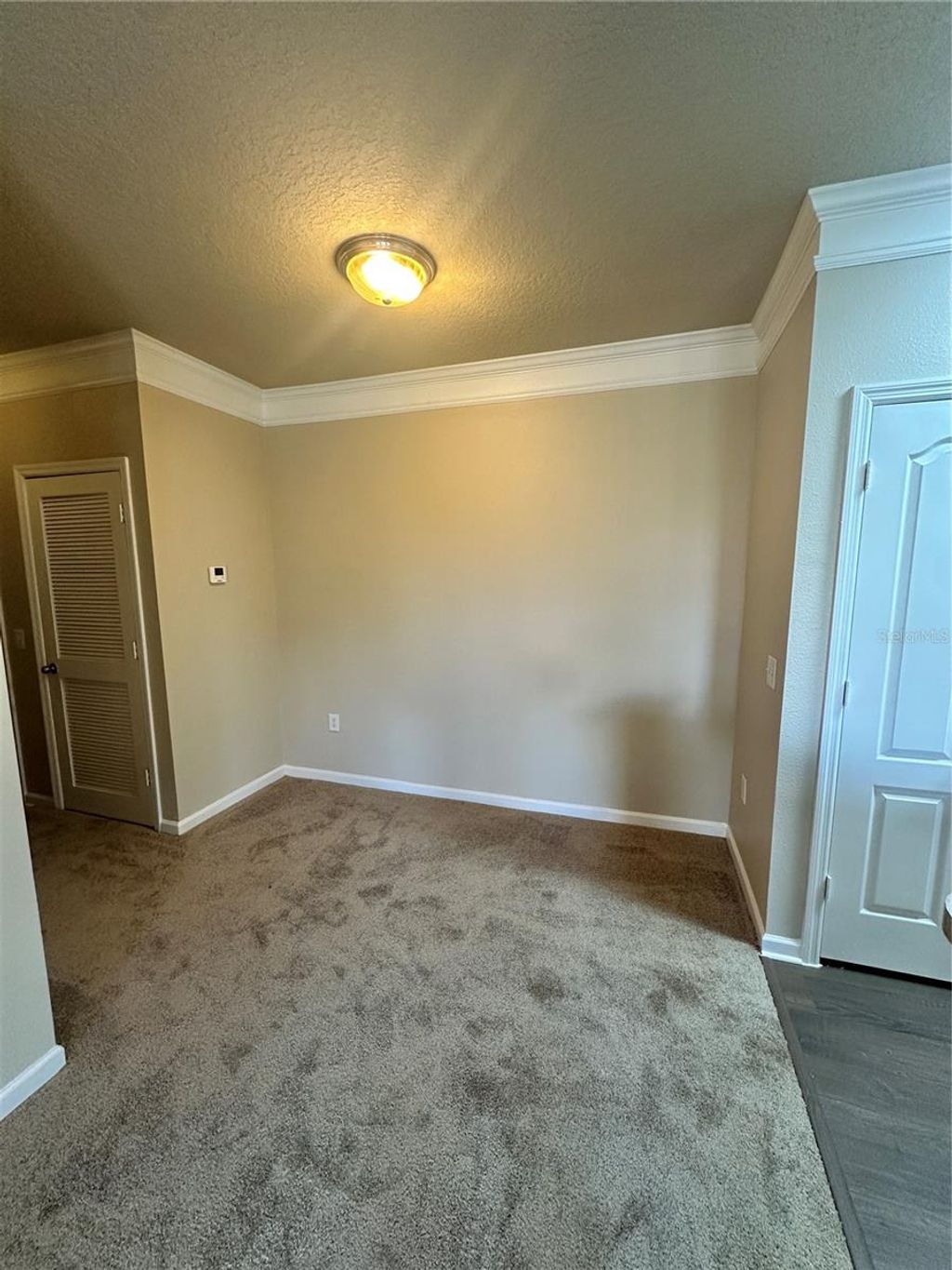 Photo of 8849 Villa View Circle #306, Orlando, FL 32821 (MLS # O6293341)