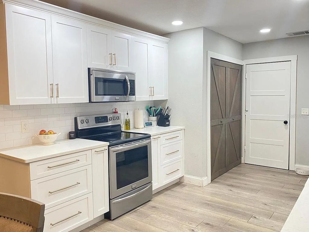 Photo of 9009 Bana Villa Court, Tampa, FL 33635 (MLS # TB8443465)