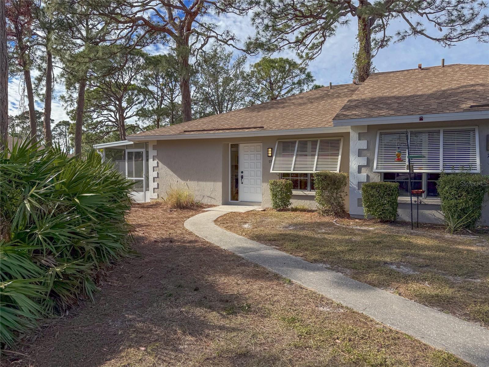 Welcome to your newly renovated two bedroom two bath villa/condo in the community of
Jefferson Pines. Close proximity to downtown Sarasota to experience all the restaurants,
shopping and waterfront the city has. This unit has been completely remodeled from
top to bottom to include vinyl flooring and 6 inch baseboard throughout, recessed lighting
throughout, new air conditioning unit in 2024, new hot water heater in 2024, new bathrooms,
vanities, showers, and tub, as well as a completely remodeled kitchen with solid wood cabinets,
and all new stainless appliances and of course fresh paint throughout the unit. Also, a
completely new lanai enclosure as well as new concrete slab. The community itself has matured
landscaping, a community pool and is a very quiet, peaceful neighborhood. The unit also
includes two numbered/assigned parking spots directly in front of the unit for your
convenience. If you’re looking for all the conveniences of Sarasota and a move-in ready Villa
come take a look. Motivated Seller, Let's talk today!