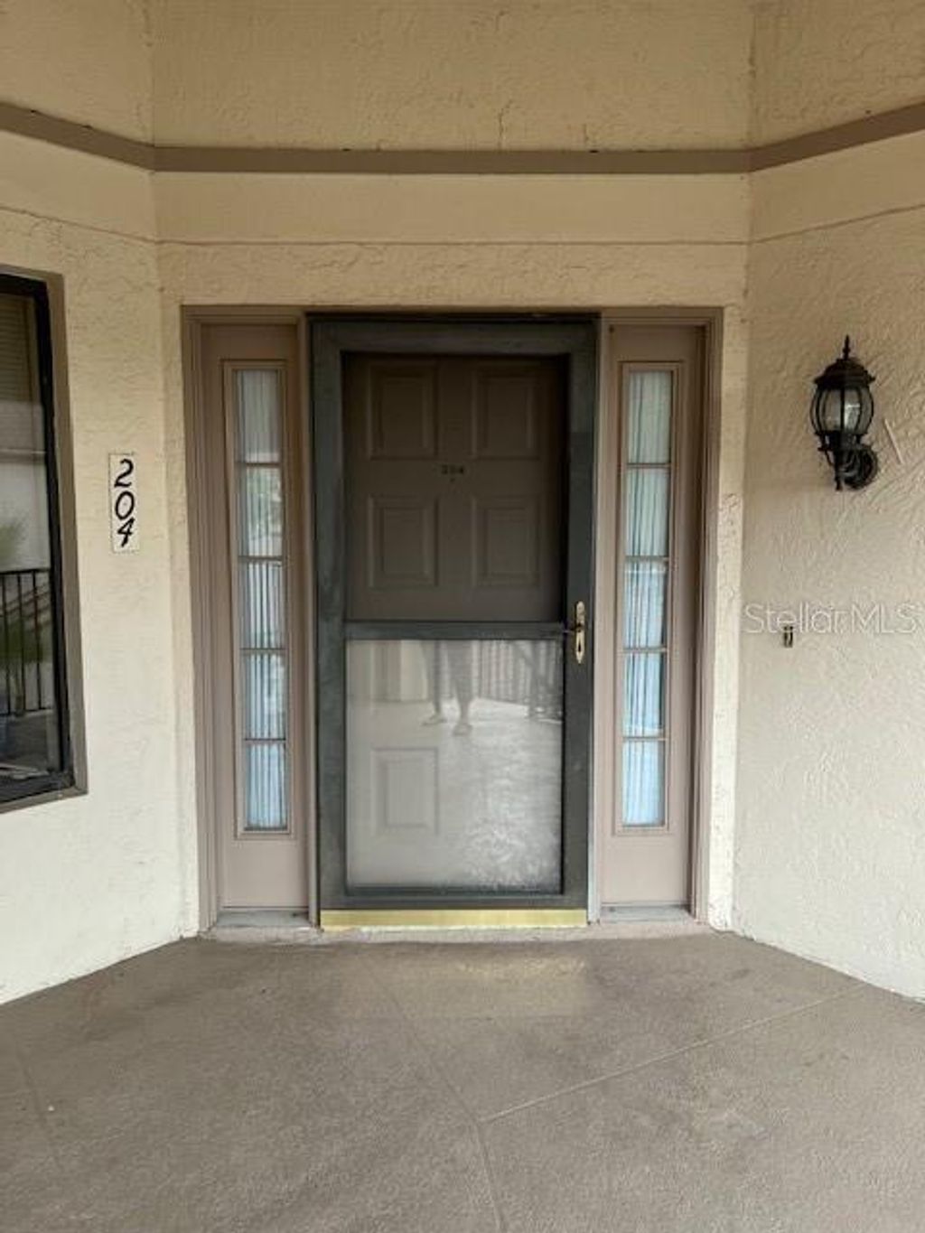 Photo of 3000 Red Oak Court #204, Palm Harbor, FL 34684 (MLS # TB8456455)