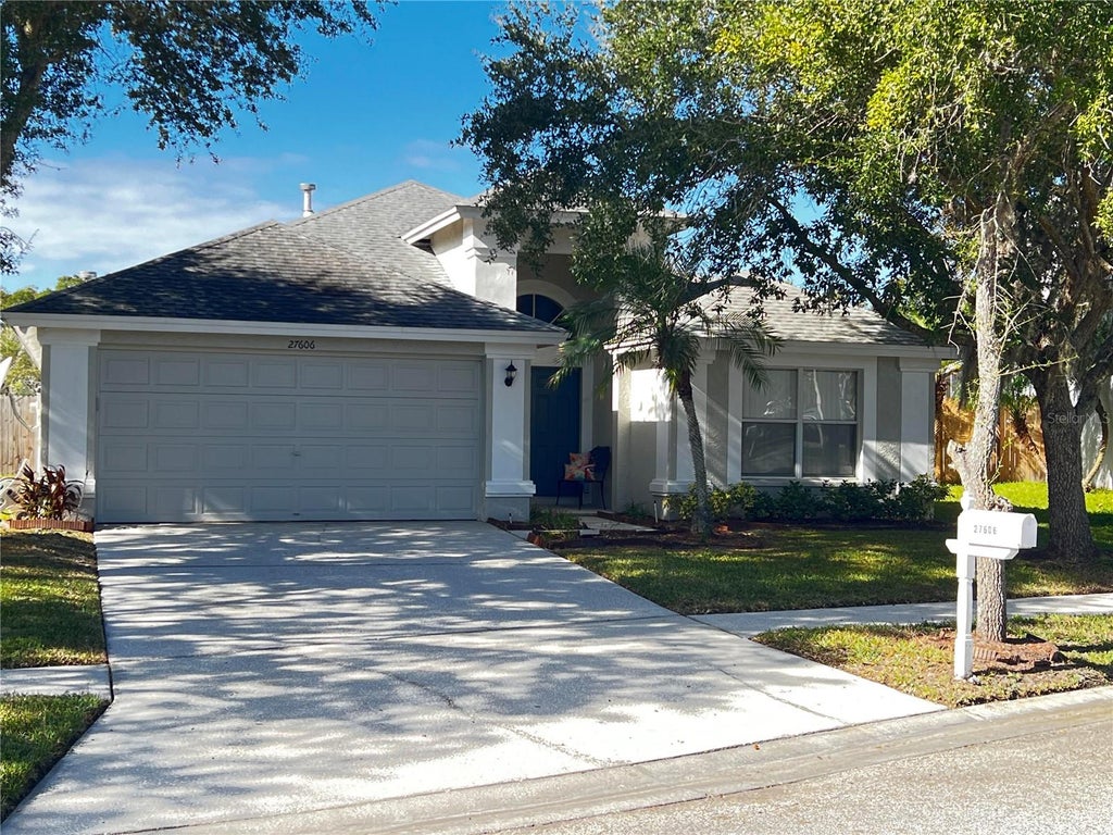 Photo of 27606 Sky Lake Circle, Wesley Chapel, FL 33544 (MLS # TB8553855)