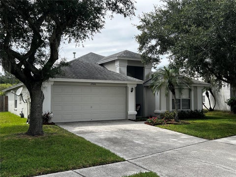 Photo of 27606 Sky Lake Circle, Wesley Chapel, FL 33544 (MLS # TB8553855)
