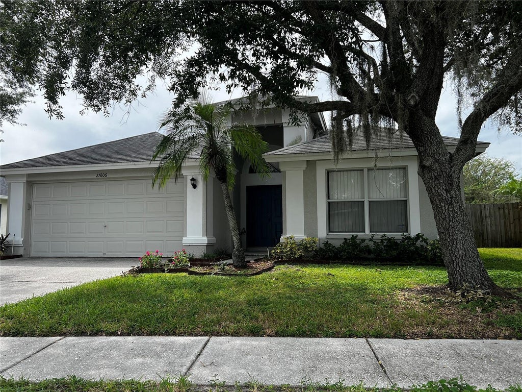 Photo of 27606 Sky Lake Circle, Wesley Chapel, FL 33544 (MLS # TB8553855)