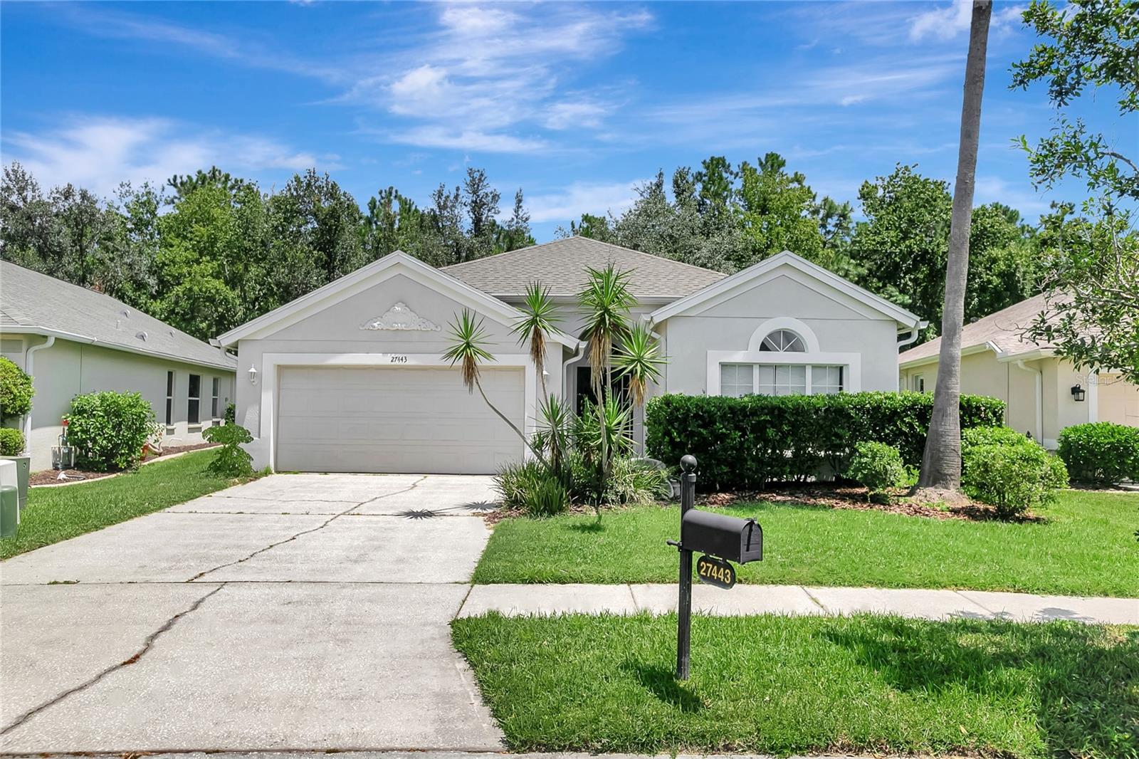 Welcome to this spacious 3-bedroom, 2-bathroom home in the highly desirable Seven Oaks community of Wesley Chapel. With 1,954 sq ft of living space, this home offers comfort, functionality, and convenience.
Seven Oaks residents enjoy access to resort-style amenities, including three pools, a clubhouse, tennis courts, and scenic walking trails. The community is also conveniently located near major roadways, shopping, dining, and top-rated schools.
The home features a 2-car garage for secure parking, tree-lined sidewalks for safe and pleasant walks or jogs, and a covered back porch with peaceful wooded views. Inside, you'll find a generous great room and an open-concept layout—perfect for entertaining. The kitchen includes ample counter and cabinet space, a pantry, and a breakfast nook ideal for casual meals. Appliances include a side-by-side refrigerator, glass-top stove, built-in microwave, and dishwasher.
The primary suite boasts a tray ceiling, walk-in closet, and a spacious private bath with dual sinks, a step-in shower, and a separate water closet. Additional features include window coverings for privacy, ceiling fans for comfort, and central heating and air to keep you comfortable year-round.
This is a wonderful opportunity to enjoy comfortable living in a vibrant, well-connected neighborhood.