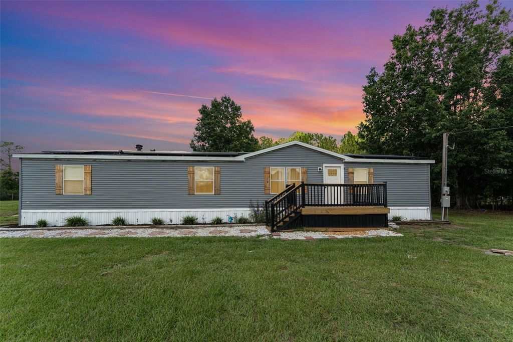 Photo of 8647 Cross Creek Road, Polk City, FL 33868 (MLS # TB8421826)