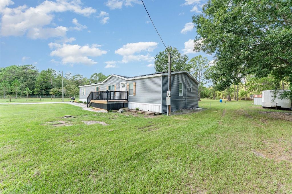Photo of 8647 Cross Creek Road, Polk City, FL 33868 (MLS # TB8421826)