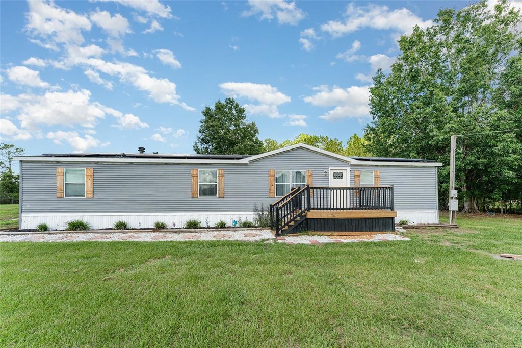 Photo of 8647 Cross Creek Road, Polk City, FL 33868 (MLS # TB8421826)