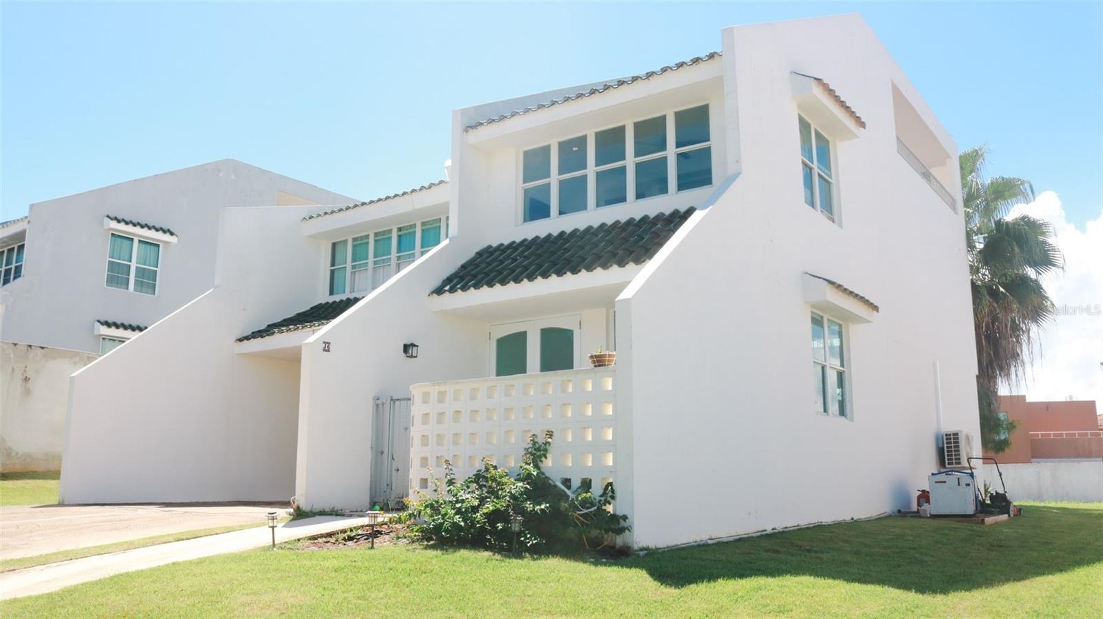 Discover your dream home in a secure, gated community, perfectly located in one of Puerto Rico's most desirable investment areas.
This stunning three-story residence offers an exceptional blend of space, comfort, and convenience, placing you just minutes away from pristine beaches, world-class resorts, top-rated schools, and the vibrant culture of Dorado.
Step inside and be captivated by the spacious, well-designed layout. The home features three generous bedrooms, two and a half bathrooms, providing ample space for family and guests. Entertain with ease in the dedicated living room, dining room, and a cozy family room perfect for relaxing evenings. The open concept kitchen is a chef's delight, ready for culinary creations surrounded by family and friends.
The top floor is a true sanctuary, boasting a partly roofed terrace where you can enjoy your morning coffee or host unforgettable gatherings while taking in the beautiful surroundings. The property also includes a convenient car garage and a massive backyard, offering endless possibilities for outdoor living, from gardening to creating your own private oasis.
Enjoy uninterrupted comfort and peace of mind with a powerful 12.2 kw electric generator that automatically kicks in during any power outage, ensuring the entire house remains fully operational.
Property Highlights:
* Bedrooms: 3
* Bathrooms: 2 1/2
* Floors: 3
* 12.2 KW Electric Generator
* Amenities: Kitchen, Living Room, Dining Room, Family Room, Garage, Partly Roofed Terrace, Large Backyard
* Location: Gated community near pristine beaches, Dorado, hotels, and schools
This isn't just a home; it's a lifestyle. Don't miss your chance to own a piece of paradise in a prime location!
Investors: AIRBNB permitted in the complex.