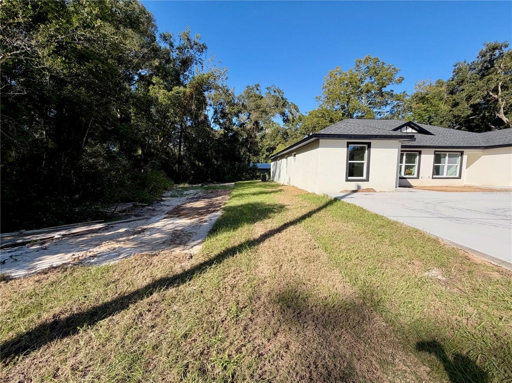 Photo of 1420 NW 17th Avenue #1,2, Ocala, FL 34475 (MLS # O6453881)