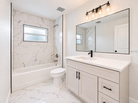 Tiny photo for 1420 NW 17th Avenue #1,2, Ocala, FL 34475 (MLS # O6453881)