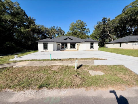 Photo of 1420 NW 17th Avenue #1,2, Ocala, FL 34475 (MLS # O6453881)