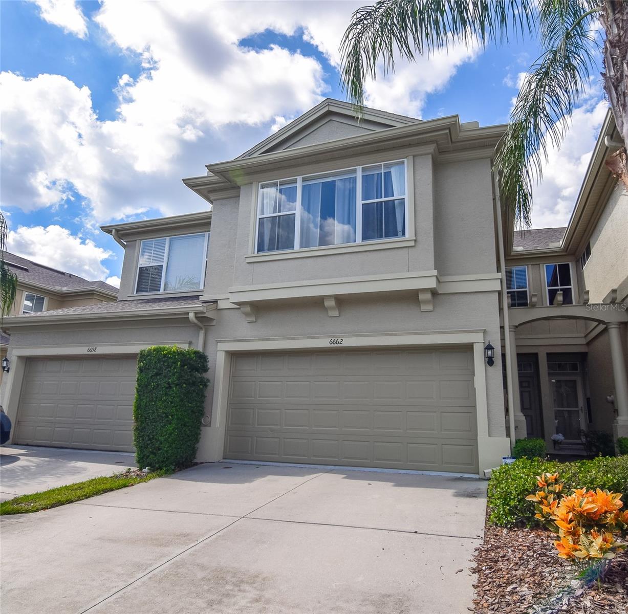 DON’T MISS THIS 2BR/2.5BA TOWNHOUSE IN THE GATED COMMUNITY OF THE TOWNHOMES OF PALMBROOKE IN PINELLAS PARK! Built in 2005, this spacious townhouse features over 1,700 Sq Ft of living space and is in move-in ready condition! The interior features a large kitchen with granite counters and stainless appliances, and a breakfast nook for more casual meals. Enjoy beautiful, engineered wood floors, high ceilings, and crown molding in the living room and dining room areas, plus a half bath for guests. There’s plenty of natural sunlight in this unit, thanks to the sliders leading to the screened porch out back, perfect for enjoying outdoor relaxation and more. Upstairs, there’s a LARGE LOFT/2ND LIVING ROOM AREA, perfect for a study area, remote work, or an additional home theater space. The primary bedroom features luxury vinyl floors, VAULTED CEILINGS, a luxurious updated bathroom, and a spacious WALK-IN CLOSET. The 2nd bedroom is located on the opposite side of the loft area, offering added privacy, with luxury vinyl flooring, ample closet space, and an adjacent hall bath with a tub/shower combo. There’s a laundry closet on the 2nd floor, complete with a WASHER AND DRYER SET for added convenience! This townhouse has tons of storage space, including a 2-car garage with overhead storage, plus a NEW HVAC in 2022. This community offers a HEATED POOL, beautiful landscaping, and low HOA fees of $360/mo that include cable, internet, sewer, trash and recycling. This property is located in a NON-FLOOD ZONE and central to the beaches, Downtown St Pete, and the Tampa Airport! Make an appointment to see this home today!
