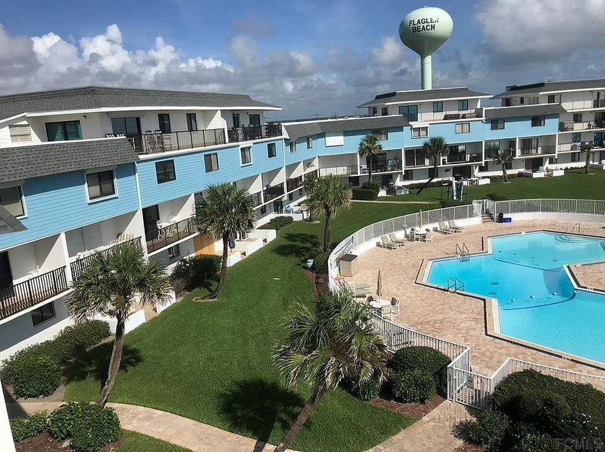 You will fall in love with the Absolutely Stunning Unobstructed Ocean View that this property offers. Watch the dolphins jump, while relaxing on the oversized private wrap around patio. This fully furnished unit has a current & transferrable SHORT TERM RENTAL License (this is GOLD!) and a solid rental history. Interior is spacious and has been nicely maintained. The A/C is 1 year old, Both bathrooms have been renovated (one has just been completed). Another perk includes Freshly Painted Exterior of Building. The grounds are very well maintained and features a refreshing pool, tennis court, picnic area and even shuffleboard! All this and you are only steps away from the private walk way to the beach. Flagler Beach is definitely a GEM and the location provides you a short 30 min. drive to Historical St. Augustine, 30 mins to Daytona & 90 mins. to Orlando. Whether you are looking for a new place to call home, an investment or get-away this Unit has all you need! ;Water: City