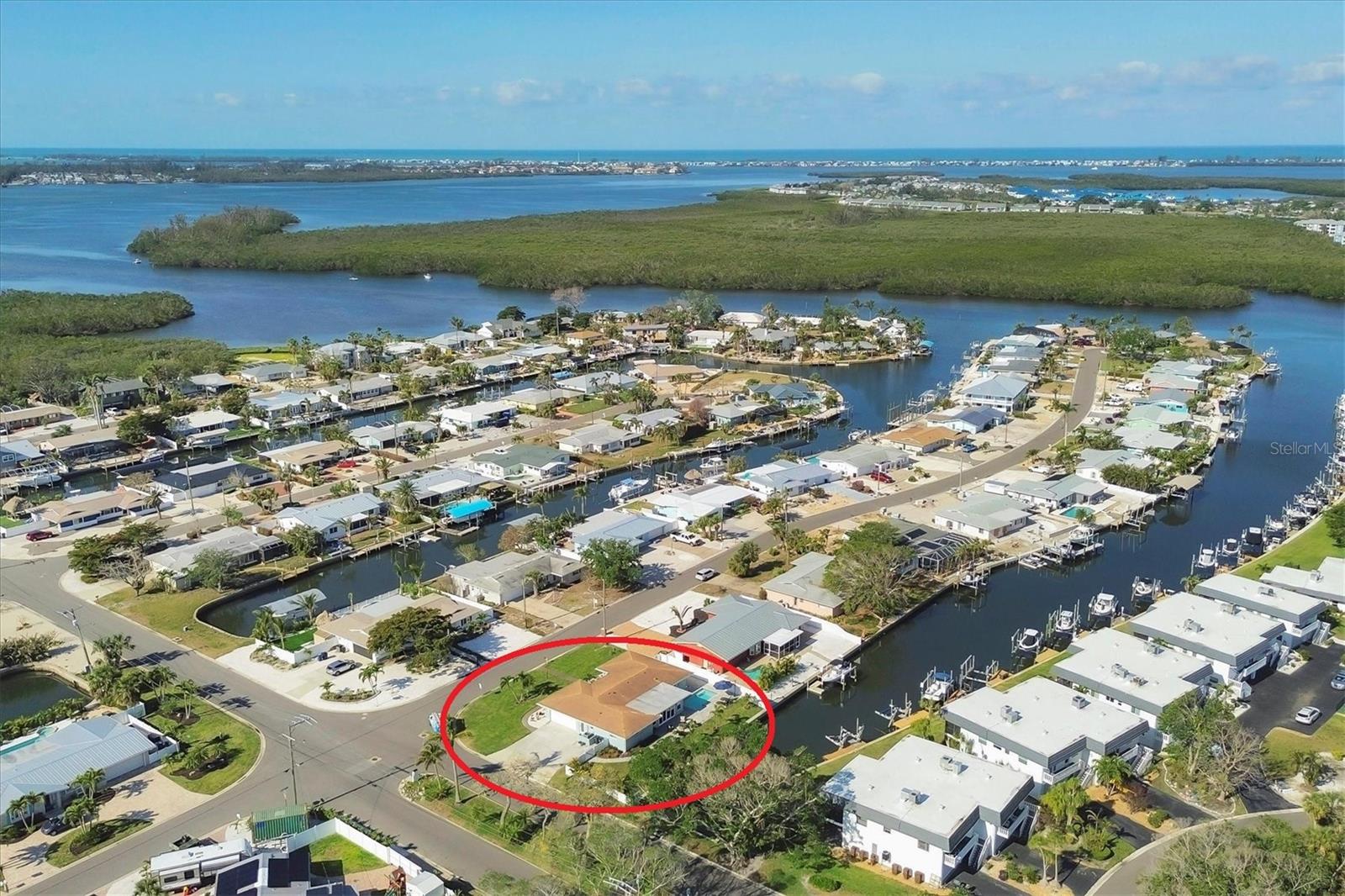 FLAMINGO CAY FANTASY! Welcome to an unparalleled opportunity to transform your dream waterfront oasis into reality! Nestled on a sizeable corner lot, at the front of a cul-de-sac street in the coveted community of Flamingo Cay, this property sits majestically on a saltwater canal with DIRECT ACCESS TO PALMA SOLA BAY!!! Traversing the threshold, you’ll find yourself instantly taken aback by the accommodating great room floor plan flaunting sweeping views from stem to stern, allowing you to transition seamlessly into your colossal bonus room highlighted by sliding glass doors leading out to your open-air paver-laden lanai and crystal-clear waters of your NEWLY CONSTRUCTED PRIVATE POOL. Just imagine sitting whilst taking in the cool morning breeze, sipping on your favorite brew, and looking out to the reticent glistening waters in your backyard. After finishing your morning coffee, you can abscond in a seaworthy vessel that will be conveniently located BEHIND YOUR HOME!!! After a day of cruising the pristine waters of the Florida Gulf Coast, you get to come home to a sprawling 2,000 sq. ft. +/- of refined living space. Your Florida Dream Home offers you and yours a charming split-bedroom floor plan, allowing residents and guests to take solace in having their own place of solitude. Too, it shares space with a charming dinette and is rounded out by a FULLY UPDATED and respectably outfitted kitchen poised in the heart of the home overlooking the great room, so you won’t miss a second of the action. Did we mention the chef of the home will certainly not go wanting as your kitchen overflows with upgrades consistent with the overall theme of your new home, from a full suite of stainless-steel appliances, tasteful CAMBRIA COUNTERTOPS, to the eat in space provided by way of your kitchen island, and plethora of storage space provided by wall-to-wall cabinetry… what else could one want for? Other notable features that certainly won’t go overlooked or unappreciated include IMPACT WINDOWS AND DOORS, NEW HVAC, FRESHLY LANDSCAPED, and EXPANSIVE LAUNDRY ROOM, providing direct access to the master en-suite, with ample storage space by way of custom-installed cabinetry. Because what is it to own a home without peace of mind? To go one step further, the lion's share of your floors are adorned with NEW attractive ceramic wood-look tile… and NOT ONE STITCH OF CARPETING throughout the entirety of the home. Lastly, and certainly not of the least importance, in the event you choose not to use your slice of paradise year-round, SHORT-TERM,WEEKLY, RENTALS ARE ALLOWED, and your home is certainly an entertainer’s paradise. Playing host to copious amounts of outdoor space, lounging areas, a private pool, and a FENCED YARD, once you arrive, there’s no reason to ever leave! Lest we forget, your new community of Flamingo Cay, to enhance the appeal, boasts a VERY LOW OPTIONAL HOA with annual dues of $175.00 per year. Enjoy the benefits of a well-maintained and friendly neighborhood without breaking the bank. We would be remiss if we failed to call attention to the fact that you’re LITERAL SECONDS away from sitting with your toes in the sand of one of our many world-renowned beaches, not to mention a plethora of shops and local eateries with some of the best views in the entire state! DO NOT ALLOW THIS OPPORTUNITY TO SAIL OFF INTO THE SUNSET WITHOUT YOU!!! ***SELLER OFFERING $10,000.00 CREDIT TOWARDS DOCK & LIFT TO ALL ACCEPTABLE OFFERS!***