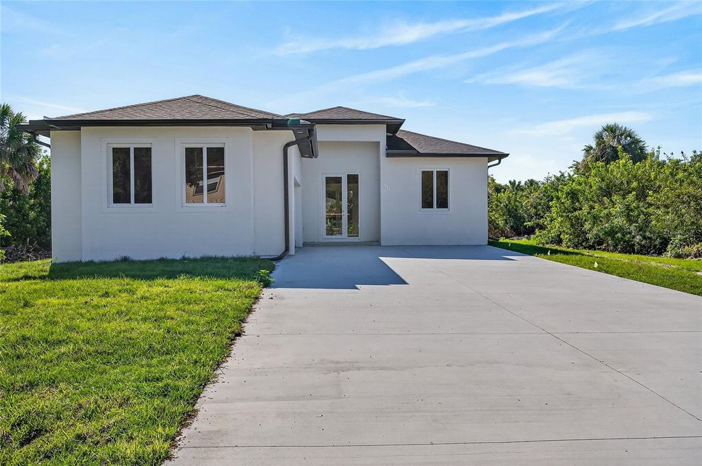 Photo of 511 Sweetwater Drive, Rotonda West, FL 33947 (MLS # N6143700)