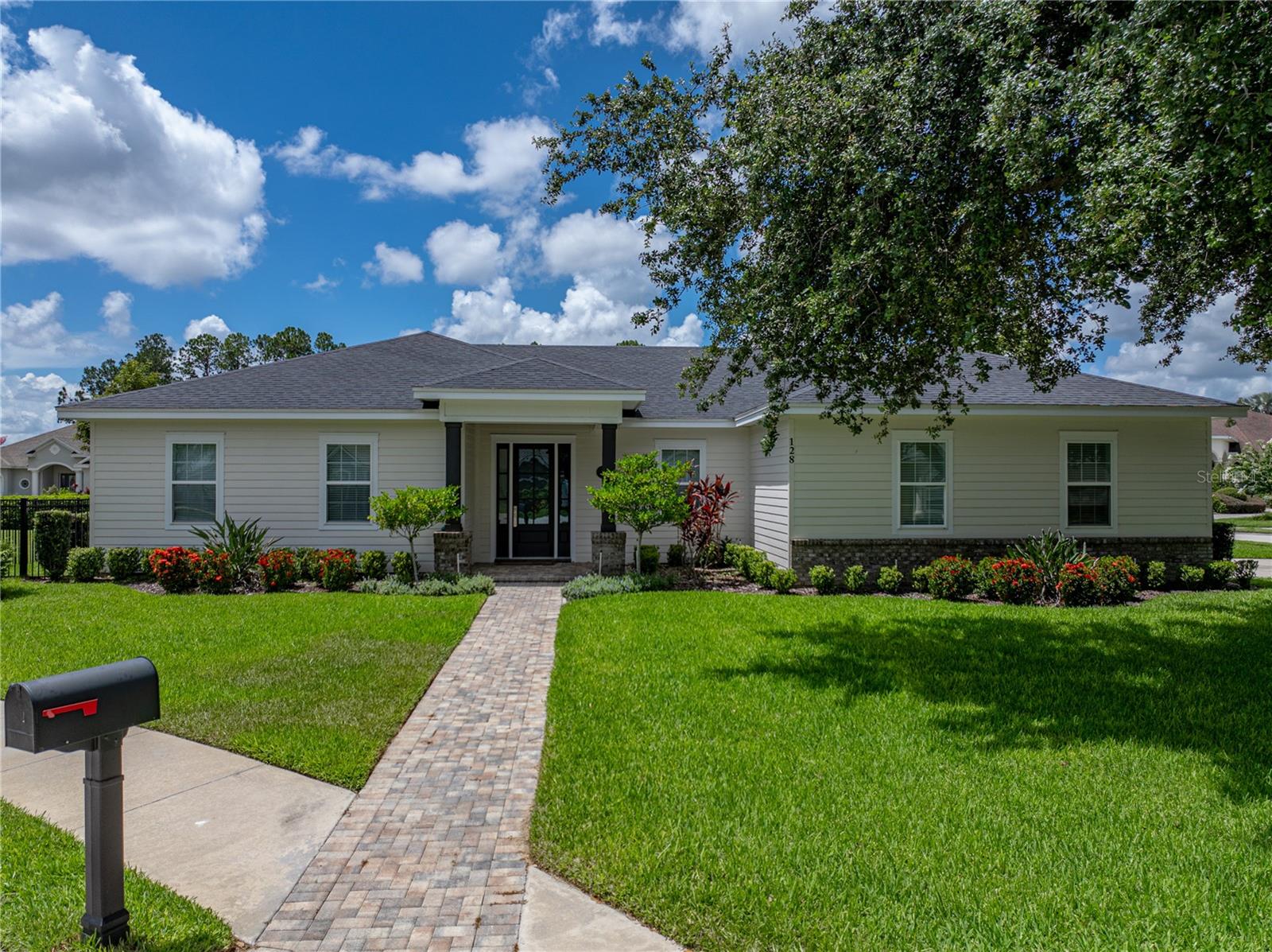 Welcome to 128 Melissa Trail – A Stylish & Spacious Home in Gated Lake Arietta Reserve
Tucked away in the private, gated community of Lake Arietta Reserve, this beautifully upgraded 4-bedroom, 2.5-bath home (or 3 bedrooms + office) offers 2,250 sq ft of thoughtfully designed living space in a quiet cul-de-sac setting. Built in 2020, this home combines modern efficiency with elegant finishes, including luxury vinyl plank flooring, granite countertops, a custom range hood, and a Generac whole-home generator.
The heart of the home is the open-concept kitchen, complete with a massive center island, walk-in pantry, and cozy breakfast nook—perfect for entertaining or everyday living. The large primary suite features a luxurious bathroom with dual sinks, a soaking tub, separate shower, and a huge walk-in closet. A split-bedroom layout offers privacy, and the 4th bedroom is ideal as a guest room, office, or den.
Enjoy indoor-outdoor living with wide sliding doors that lead to a screened-in lanai, additional paver patio space, and a fully fenced backyard. The beautifully landscaped front yard is anchored by a stunning, mature oak tree that adds charm and curb appeal. Additional highlights include a tankless water heater, privacy window shades, and a spacious 26x25 side-load garage with ample driveway space.
With community lake access to the private Lake Arietta and proximity to I-4, downtown Auburndale, and local schools, this move-in-ready home blends comfort, function, and style in one of Central Florida’s most desirable neighborhoods.