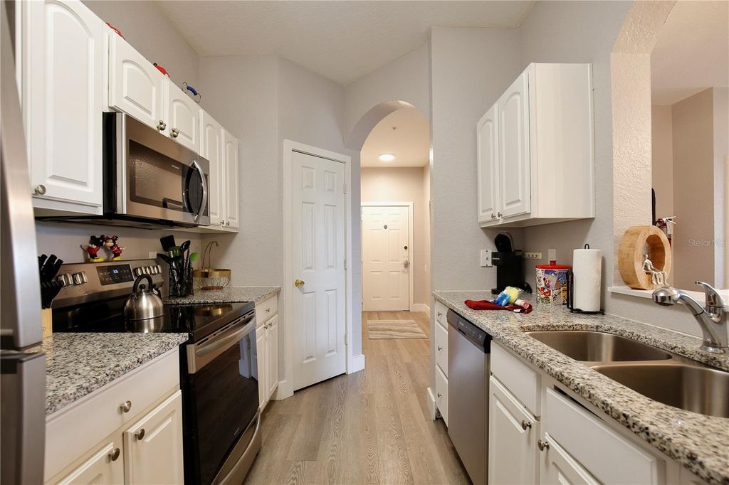 Photo of 2821 Almaton Loop #301, Kissimmee, FL 34747 (MLS # O6344741)