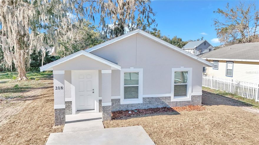 This stunning 4 bedroom, 2 bath home, built with solid concrete block construction, offers modern comfort and style on a desirable corner lot. The open layout features vaulted ceilings that create an airy, spacious feel throughout, complemented by durable and stylish luxury vinyl plank flooring. The generous primary suite provides a peaceful retreat, while each bedroom includes upgraded ClosetMaid systems for excellent storage. The kitchen is a true standout, featuring elegant granite countertops, solid wood cabinetry with soft close drawers, and a large pantry to meet all your culinary needs. Enhanced wood window sills, upgraded doors and trim, and ceiling fans throughout add to the home’s quality and attention to detail. Outside, a dedicated grilling slab makes entertaining easy, and the fully fenced backyard offers privacy and functionality. A new DuraFence with matching rails is scheduled to be installed soon. Conveniently located near downtown Ocala with quick access to major highways, local amenities, parks, and green spaces, this home offers the best of modern living with everyday convenience. Please note that the photos shown are of the model home and not the actual property. Don’t miss the opportunity to make this beautiful new home yours. Schedule your showing today before it’s gone.