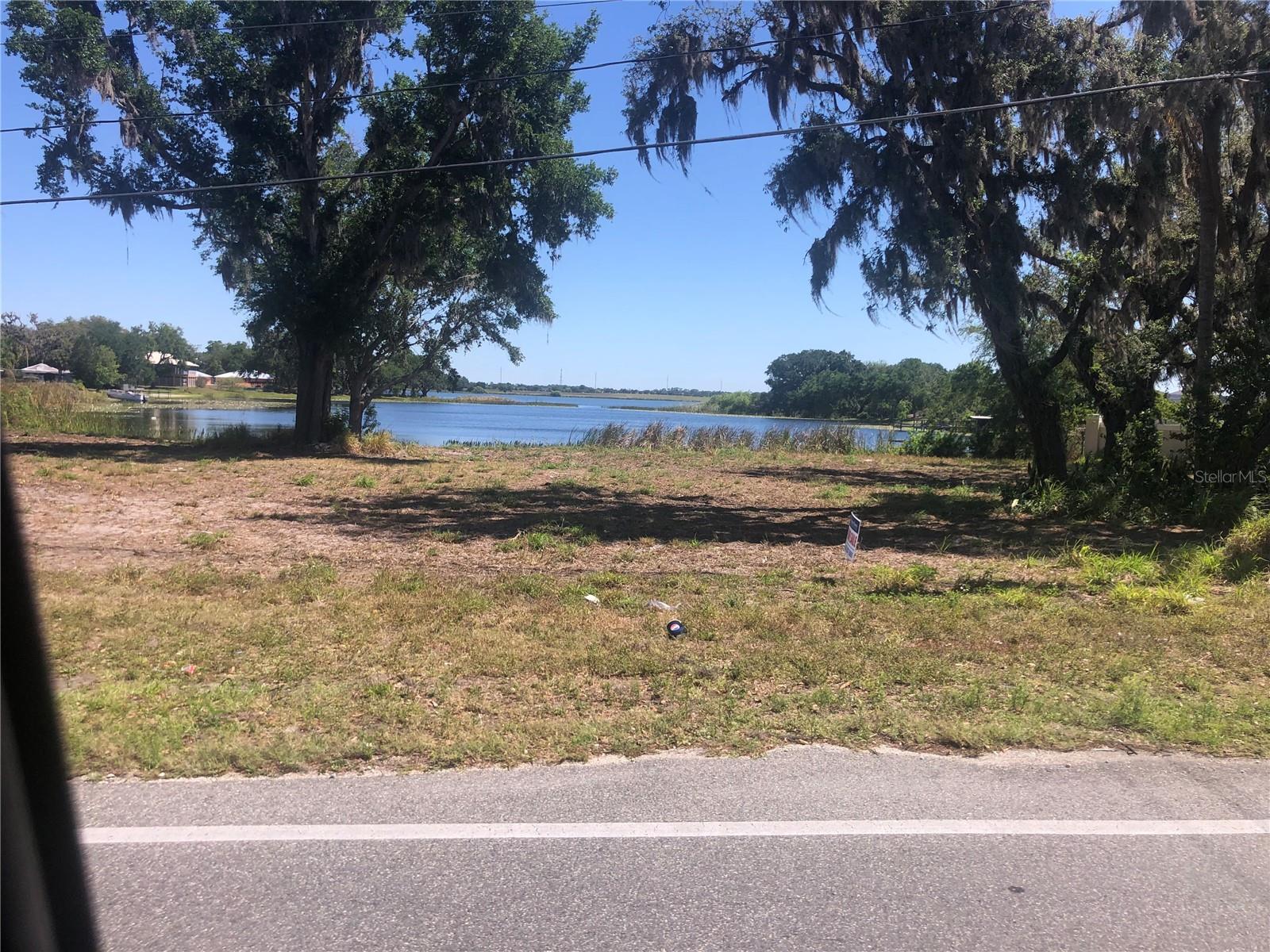 LAKEFRONT LOT! This is one of 3 lots being sold as combined or individually. Lot 1-$120,000, Lot 2-$130,000 and Lot 3-$130,000. Buy all three at combined of $380,000 or by one. All three lots have water frontage. Spirit Lake is great for fishing and skiing. This location is short drive to downtown Winter Haven and close to the Polk Parkway for easy access to Tampa or Orlando.