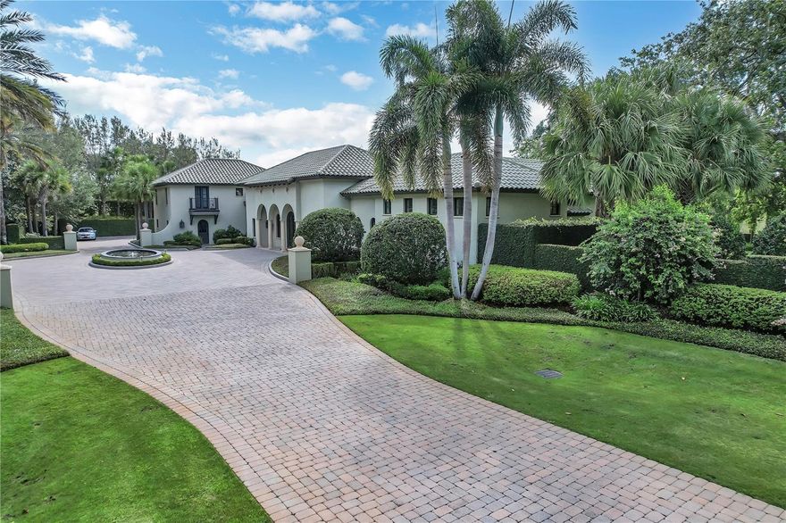 Masterfully designed with exquisite architectural detail, this modern fortress was completed in 2011 with only the finest of finishes. The 4 bedroom, 6 bath residence overlooks 3.67 meticulously manicured acres. And, with just under 11,000 square feet under roof, the home features extensive custom moldings, 7” rift cut Oak flooring, extensive custom-built cabinetry and much more. The stunning primary suite includes his and her private dressing rooms with spa bath of handpicked Italian marble overlooking a private garden. The epicurean kitchen has a large marble island with vegetable sink, Wolf commercial six-burner gas range, separate gas grill and side burner, Subzero refrigerator, Subzero freezer, Gaggenan built-in ovens, (2) Bosch dishwashers, (2) walk-in pantries, warming drawer and built-in workstation. Other notable features of the home include the study with gas fireplace, a butler’s pantry, bar with hammered sink and mini refrigerator, a walk-in linen closet, and lovely powder bath.

Downstairs there is a large, carpeted playroom, a 10x23 studio/dark room, locked gun closet, wine cellar, 23x24 cinema room with 8 overstuffed chairs and 35x49 unfinished basement.

Additional features include the climate controlled Geo-thermal system, whole-house generator, whole-house leak detection system, (2) tankless hot water heaters, and a whole-house reverse osmosis system.

There is a seamless transition from the interior of the home to the exterior screened lanais and expansive terraces which allow for stunning views of the park-like setting overlooking the private pool and spa which becomes part of the home's living experience. A significant value for the buyer who secures this amazing home and property.