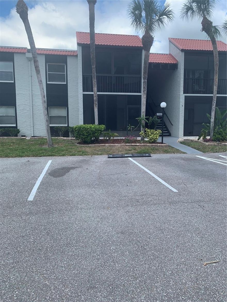 This property boasts a two bedroom two bath downstairs unit. The unit is located at the back side of the complex. The unit has tile and carpet throughout. The primary bedroom has a walk in closet. There is a light and bright enclosed lanai that has windows and also a door for access from the outside. The unit has one assigned parking space located close to the front of the unit. Guest spaces are available also. A storage room is also included. The community offers pools, tennis, shuffleboard, clubhouse and fitness area. The laundry facilities are located in each building and are common areas. No washer or dryer hook ups are in the units. Located close to shopping. restaurants, etc. Short drive to the Interstate for commuters. No motorcycles, trucks, RV's, boats or trailers of any kind are allowed. No pets. No Smoking on or in the property at any time.