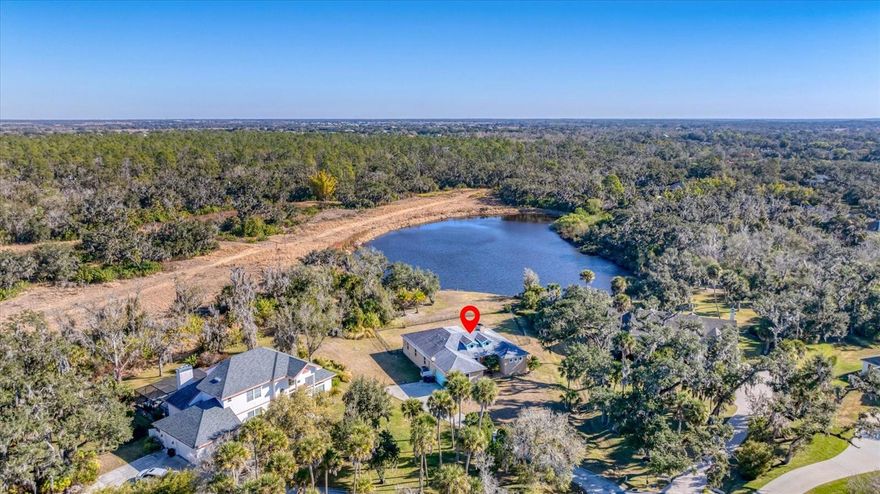 Built in 2017, this ranch-style residence offers 4 bedrooms, 2.5 bathrooms, and a bonus room situated on a 33,917 sq ft lakefront lot! The home features an open-concept layout with multiple skylights providing natural light throughout the interior. The kitchen includes an oversized island with seating and connects directly to the main living areas. The primary bedroom includes an en-suite bathroom with a soaking tub, dual vanities, and a double shower with two showerheads. The house features a split floor plan layout and the bonus room provides flexible use options. Enjoy the backyard views of the lake that overlooks the old golf course. The property is located on a cul-de-sac. Come see this home today! This property is eligible under the Freddie Mac First Look Initiative through 03/04/2026.