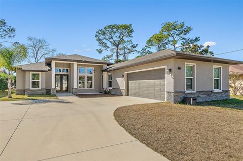 Photo of 125 Birchwood Drive, Palm Coast, FL 32137 (MLS # FC315909)