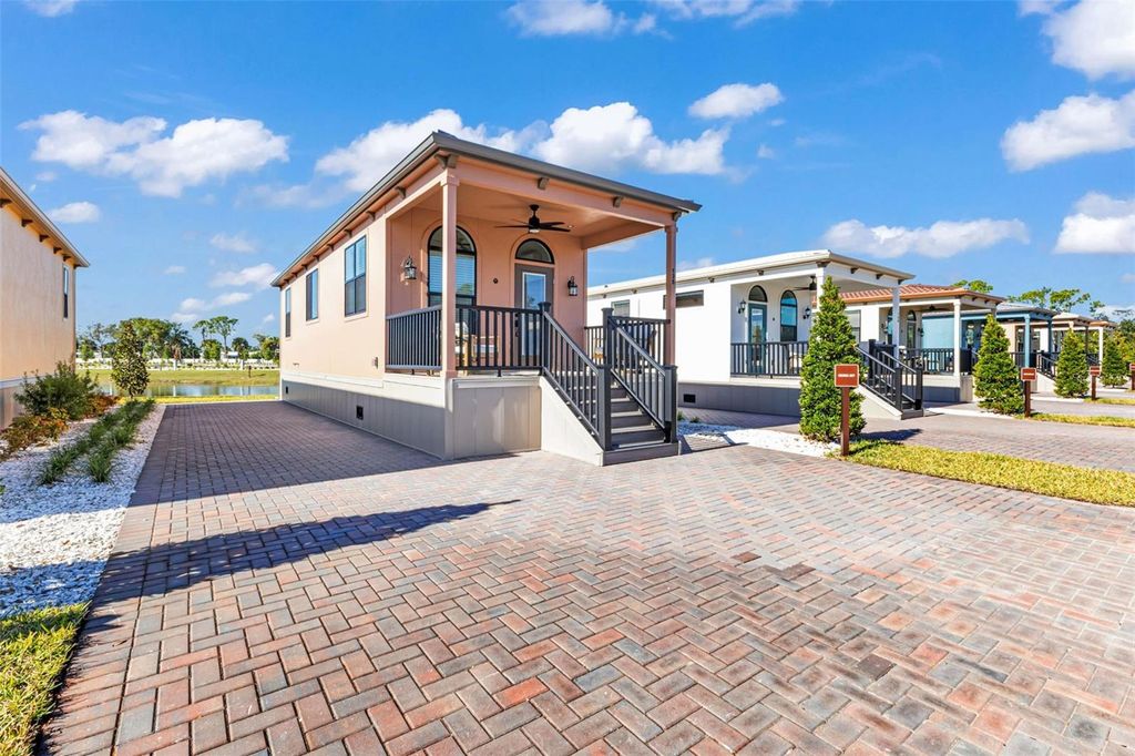 Photo of 6165 Talon Bay Drive #71, North Port, FL 34287 (MLS # TB8469243)